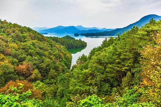 Mountains with green trees and lake landscape in South Korea