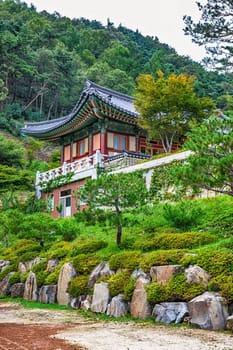Traditional asian buddhist monks temple in mountains in South Korea at autumn