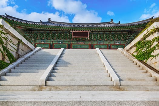 Traditional korean architecture old building palace or monks temple with stairs in South Korea at autumn