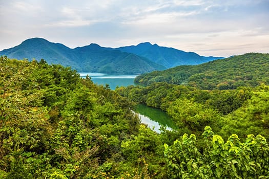 Mountains with green trees and lake landscape in South Korea