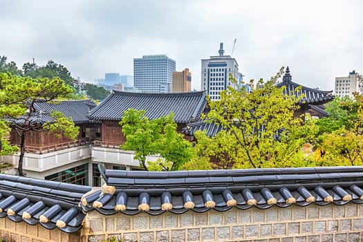 Traditional old and modern korean houses cityscape at autumn in South Korea