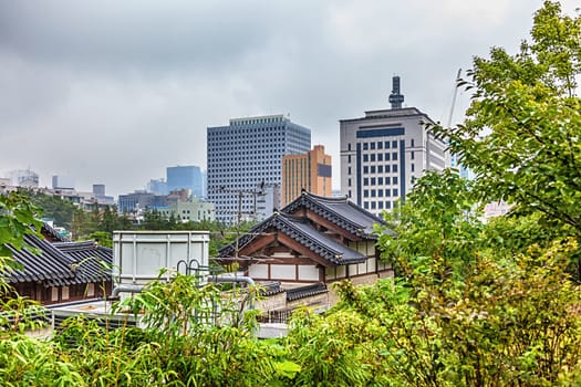 Traditional old and modern korean houses cityscape at autumn in South Korea