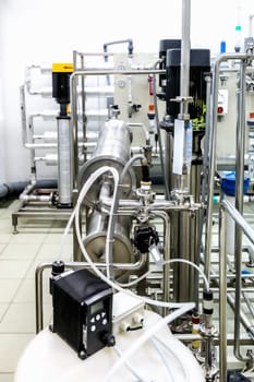 Pipes and water pump on pharmaceutical industry or chemical plant