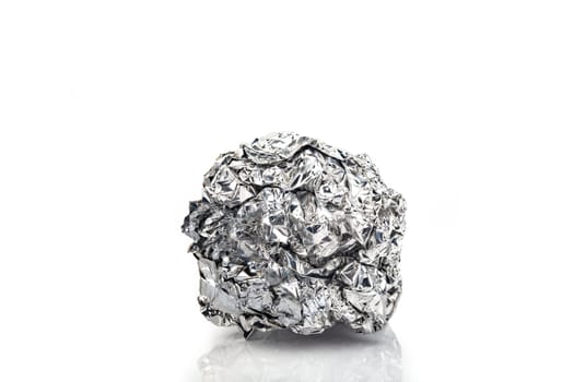 Crumpled Aluminum Foil over white background