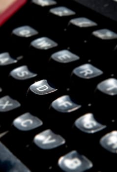 1970s dusty typewriter. Selective focus on key D