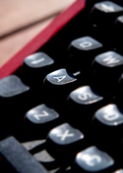 1970s dusty typewriter. Selective focus on key A