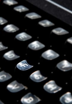 1970s dusty typewriter. Selective focus on key F