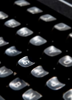 1970s dusty typewriter. Selective focus on key G