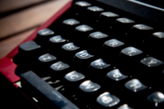 1970s dusty typewriter. Selective focus on key D