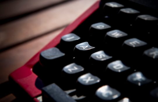 1970s dusty typewriter. Selective focus on key A