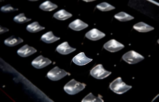 1970s dusty typewriter. Selective focus on key L