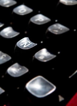 1970s dusty typewriter. Selective focus on key Ñ