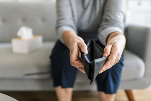 Desperate elderly woman unhappy with the rising cost of living