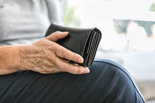 Desperate elderly woman unhappy with the rising cost of living