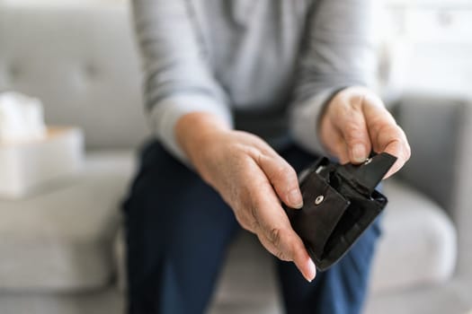 Desperate elderly woman unhappy with the rising cost of living