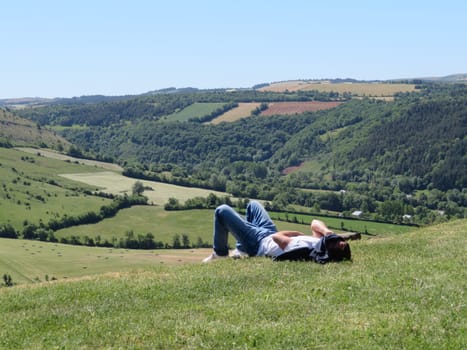 beautiful hot day to sunbathe lying on the herb rest relax