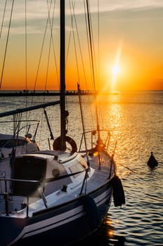 Luxary yacht in marina. Holiday traveling by sail boat at beautiful sunset in summer.