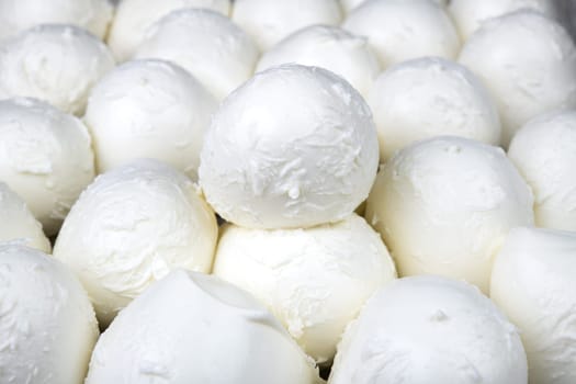 numbers of fresh mozzarella as a background