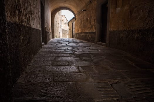 Marquis of Mirabel Palace passage of Plasencia. Medieval street at Old town, Caceres, Extremadura, Spain