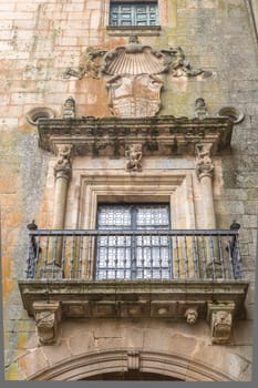 Marquis of Mirabel Palace plateresque balcony, Plasencia, Spain. Medieval street at Old town