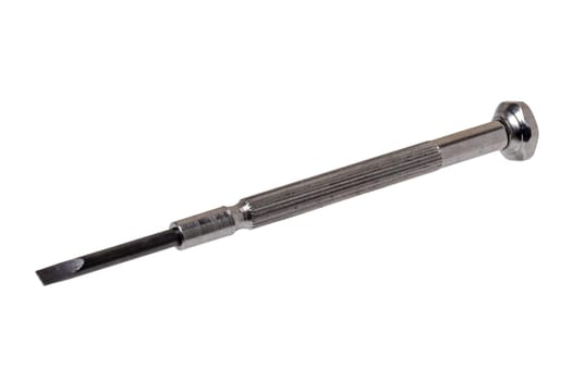 Closeup of a small metal screwdriver for performing work on installed small screws isolated on a white background. Clipping path. Macro.