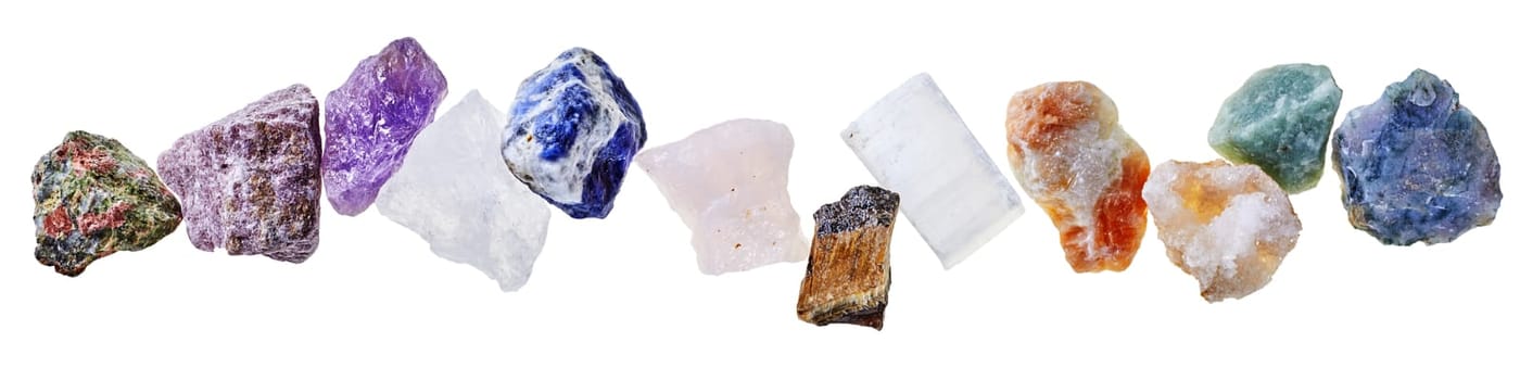 Collection of various colorful water stones for mineral water with different shapes isolated on clear white background in light studio