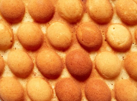 Top view of textured background of delicious egg wafer dessert with circle shaped forms