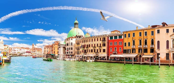 Grand Canal panorama near the Scalzi Bridge and San Simeone Piccolo church, Venice, Italy.
