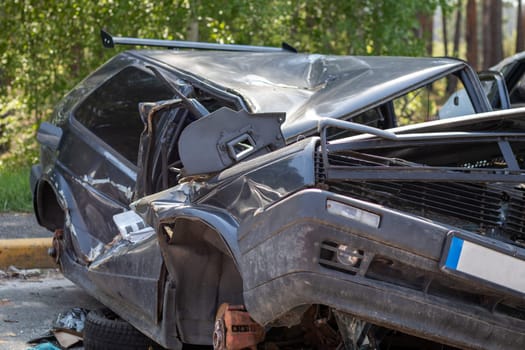Traffic accident on the street, damaged car after a collision in the city. Accident due to speeding and alcohol intoxication. Transport background. The concept of road safety and insurance