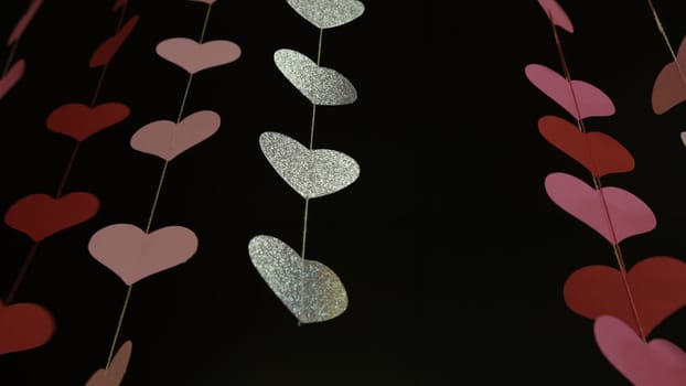 Flying red paper hearts on red dark background. Valentines Day. Symbol of love. beautiful flying pink hearts. Happy Valentines Day. Full of Love. 4k 400mb s. Love day.