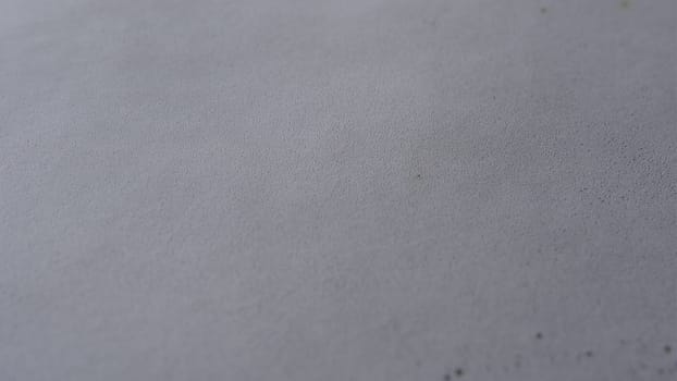 Steam or vapor clouds rising from boiling water with foam and watter bubbles. white and smooth surface.