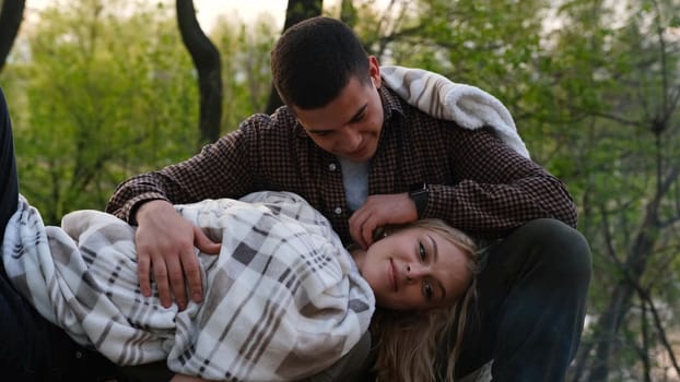 Close up couple in love with focus on girl. Portrait of smiling woman touched stroked by male hand. Tender relationship loving people. Family, dating, declaration of love concep