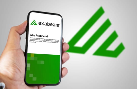 San Francisco, USA, June 2022: hand holding a phone with Exabeam mobile application on screen. Exabeam is a leading provider of the software for analyzing user and company behavior