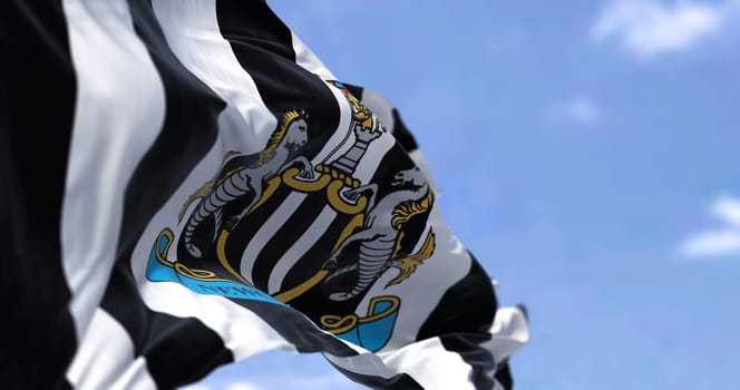 Newcastle, UK, May 2022: The flag of Newcastle United waving in the wind on a clear day. Newcastle United is an English professional football club based in Newcastle upon Tyne