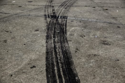 Detail of tire rubber marks, speed