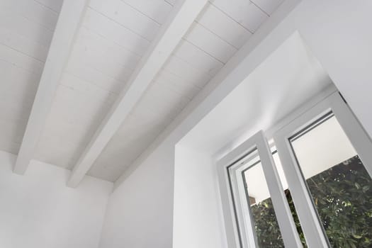 Beautiful apartment with exposed beams in modern light wood.