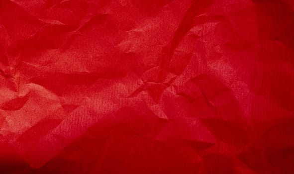 Red crumbled paper background texture