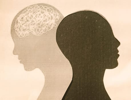 Human Brain Isolated Within Human Head and its shadow. Paper Abstract Illustration. Feelings of isolation and Mental Health concepts.