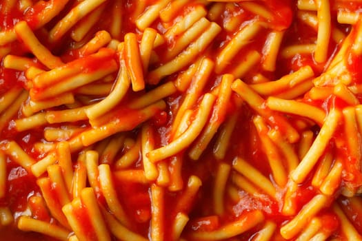 close up of spaghetti noodle in tomato sauce food background