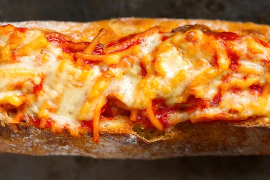 close up of rustic spaghetti in tomato sauce sandwich