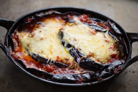 close up of rustic italian comfort food eggplant parmigiana