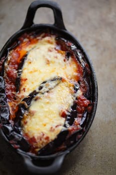 close up of rustic italian comfort food eggplant parmigiana