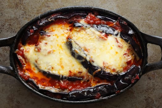 close up of rustic italian comfort food eggplant parmigiana