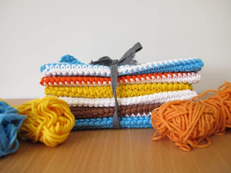 Reusable crocheted and knitted dishcloths from wool scraps