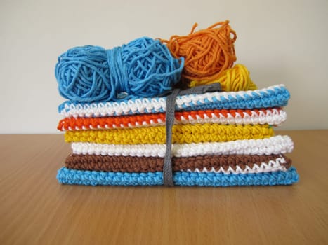 Reusable crocheted and knitted dishcloths from wool scraps