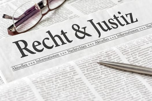 Newspaper headlined Law and Justice