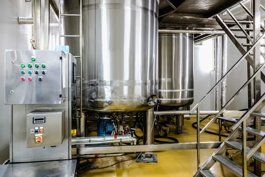 Water conditioning or distillation room with control panel equipment and water boiler or tank on pharmaceutical industry or chemical plant