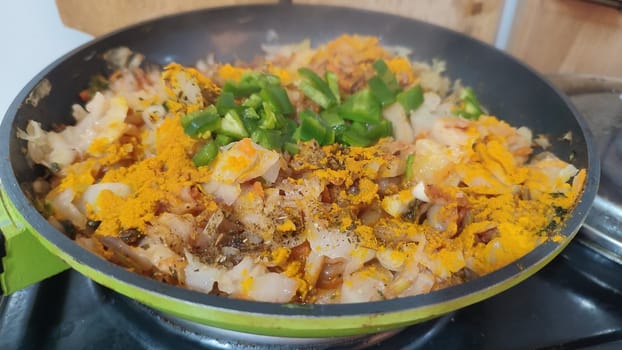 meat vegetables stewed onion frying pan healthy food meat vegetables stewed onion frying pan home cooking stove cooking recipe dish dinner lunch delicious, horizontal format photo. High quality photo