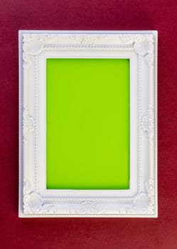 White Frame on dark red with green for your copy