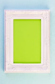 White Frame on blue background with green for your copy